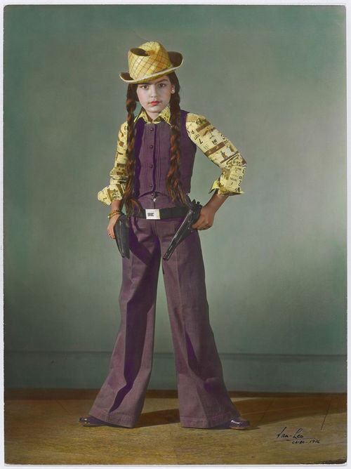 Photo of a girl in a cowboy costume