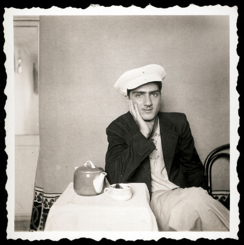 Photo of Van Leo, sitting and drinking tea
