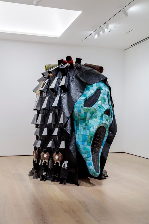 A large sculpture in the shape of the Scream mask