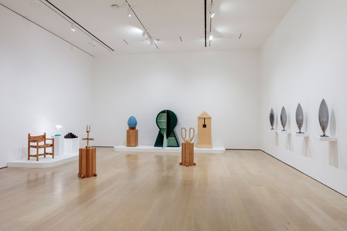 View of a gallery filled with designed furniture