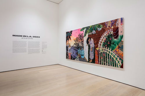 Installation image of a large, brightly colored painting