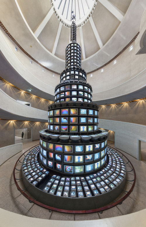 A tower of video monitors