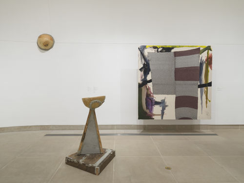 Installation image of multimedia paintings and sculptures installed in vault gallery