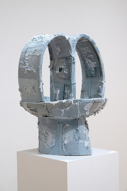 Sculpture covered in blue denim