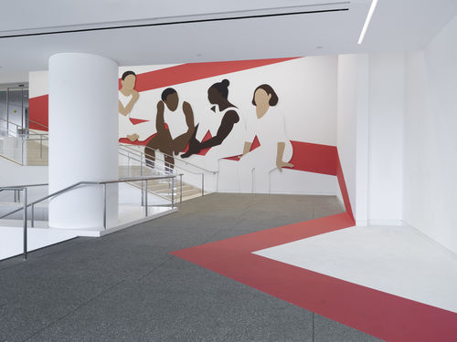 Hammer lobby wall installation depicting a group of abstracted figures, young gymnasts in leotards and high buns, which red architectural lines painted on white