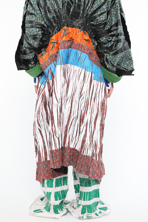 Colorful, oversized, androgynous outfit