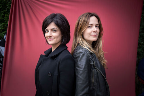Directors Isabel De Luca and Isabel Nascimento Silva standing back to back