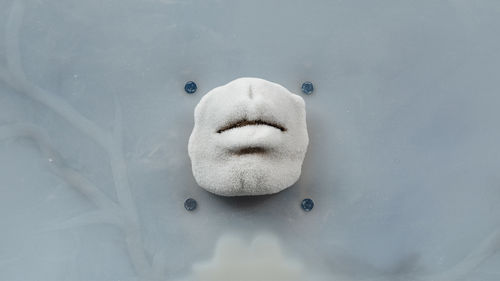 A silicone mouth covered in ice crystals