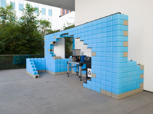 Structure made of blue recycled plastic bricks