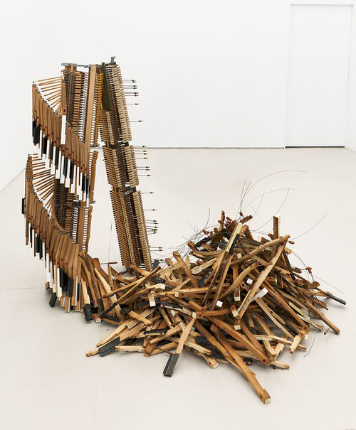 Piano that has been disassembled and turned into an abstract sculpture