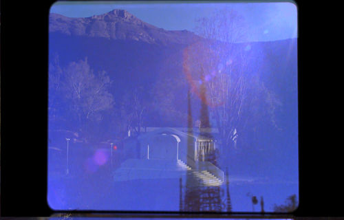 Superimposed images of Watts Towers and an ashram