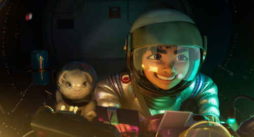 an animation image featuring a girl and a puppy in astronaut suits sit inside a spaceship