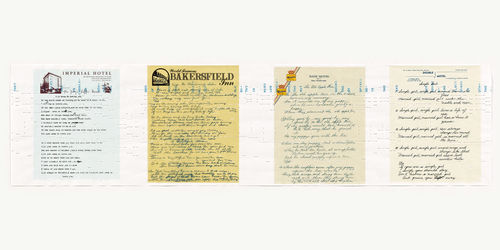 Four handwritten sheets of paper displayed on the wall in a row.