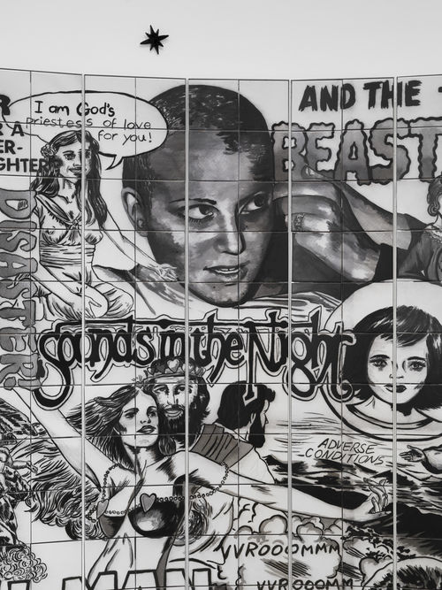 Vault installation featuring a floor-to-ceiling ceramic mural with black-and-white graphics, text, and images of people