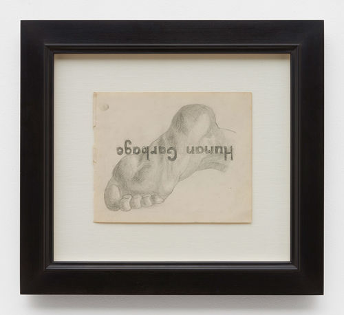 Pencil drawing of a foot, overlain with the upside-down words "Human Garbage""