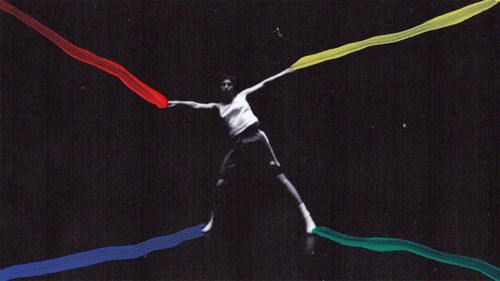 A figure with limbs splayed, colorful paint streaming from her hands and feet