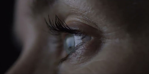 A woman's eye seen in extreme closeup