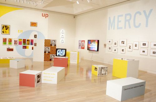 Installation view of Power Up: Sister Corita and Donald Moffett, Interlocking at the Hammer Museum, Los Angeles from February 6 – April 2, 2000