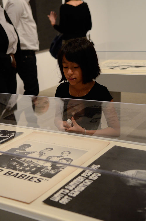 Young guest in gallery during the opening of "Now Dig This!" Hammer Museum, Los Angeles