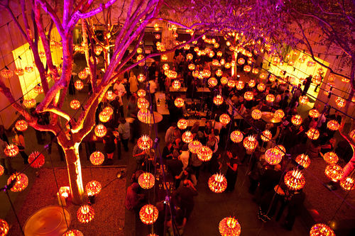 View of the courtyard, with lanterns designed by artist Jorge Pardo, during the opening of "Now Dig This!" Hammer Museum, Los Angeles