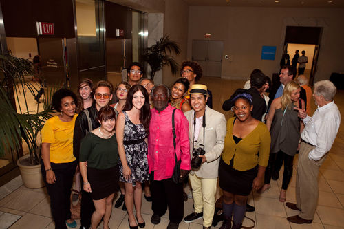 Artist Raymond Saunders (center, in magenta) and guests at the opening of "Now Dig This!" Hammer Museum, Los Angeles