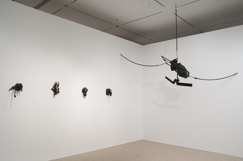 Wall: four works by Melvin Edwards, from left to right: "Some Bright Morning," 1963, "Afro-Phoenix #2," 1964, "Mojo for 1404," 1964, and "August the Squared Fire," 1965; hanging: Melvin Edwards, "Double Chain," 1966. Installation view at the Hammer Museum, Los Angeles