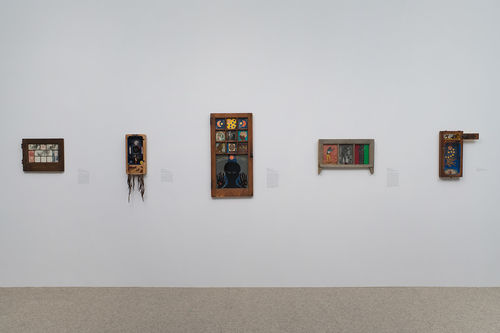 Five works by Betye Saar, from left to right: "Mystic Window for Leo," 1966, "Gris-Gris Box," 1972, "Black Girl's Window," 1969, "Let Me Entertain You," 1972, and "Vision of El Cremo," 1967. Installation view at the Hammer Museum, Los Angeles