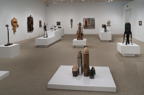Foreground: Dale Brockman Davis, "Viet Nam War Games," 1969; background: works by Betye Saar, John T. Riddle Jr., Noah Purifoy, and John Outterbridge. Installation view at the Hammer Museum, Los Angeles