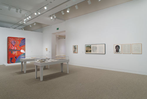 Left wall: Joe Overstreet, "The New Jemima," 1964, 1970; right wall, from left to right: David Hammons, "Untitled," 1976, two works by Charles Gaines, "Falling Leaves #5," 1979 and "FACES: Set #4, Stephan W. Walls," 1978. Installation view at the Hammer Museum, Los Angeles