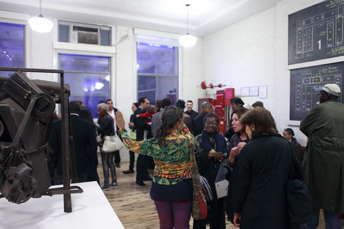 Guests in gallery during the opening reception for "Now Dig This!" MoMA PS1, Long Island City, NY