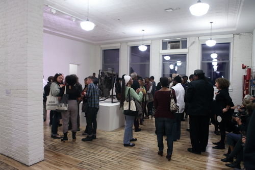 Guests in gallery during the opening reception for "Now Dig This!" MoMA PS1, Long Island City, NY