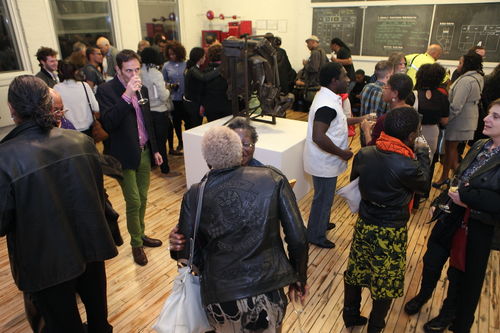 Guests in gallery during the opening reception for "Now Dig This!" MoMA PS1, Long Island City, NY