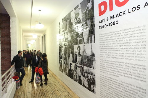 Guests outside the exhibition entrance during the opening reception for "Now Dig This!" MoMA PS1, Long Island City, NY
