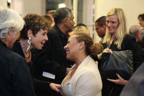 Exhibition curator Kellie Jones (center) speaks to guests during the opening reception for "Now Dig This!" MoMA PS1, Long Island City, NY