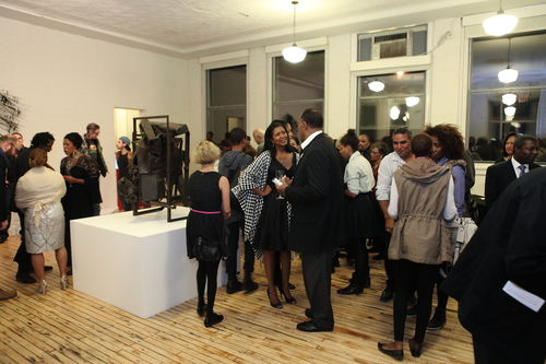Guests in gallery during the opening reception for "Now Dig This!" MoMA PS1, Long Island City, NY