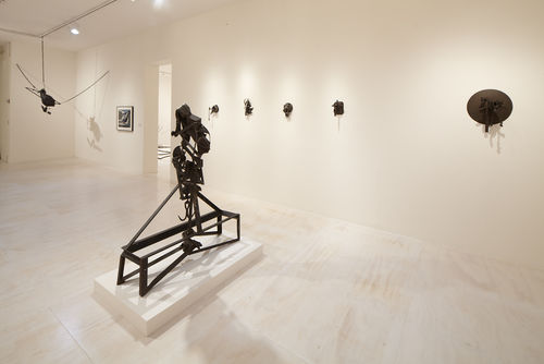 Foreground: Melvin Edwards, "The Lifted X," 1965; background: works by Melvin Edwards and William Pajaud. Installation view at MoMA PS1, Long Island City, NY