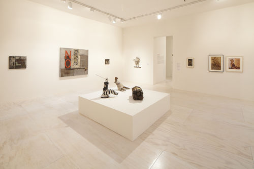 Foreground: three works by John Outterbridge; background: works by John Outterbridge and Betye Saar. Installation view at MoMA PS1, Long Island City, NY