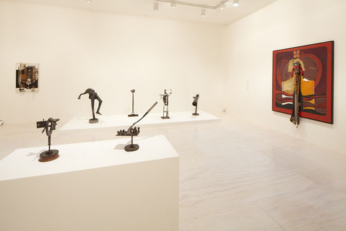 Foreground: two works by John T. Riddle Jr.; background: four works by Riddle; right wall: Alonzo Davis, "Self-Portrait Inside Series," 1975. Installation view at MoMA PS1, Long Island City, NY