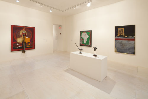 Foreground: two works by John T. Riddle Jr.," Panthers," 1970s and "Untitled," c. 1970; left wall: Alonzo Davis, "Self-Portrait Inside Series," 1975; right wall: Alonzo Davis, "Pan African Direction III," 1973 and Raymond Saunders, "American Dream," 1968. Installation view at MoMA PS1, Long Island City, NY
