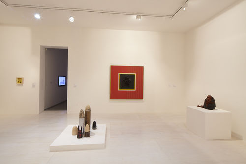 Foreground: Dale Brockman Davis, "Viet Nam War Games," 1969  and "Arabian Nights, #2," c. 1969–70; background: Sheila Levrant de Bretteville, "Taste and Style Just Aren't Enough" flyer, 1970 and Daniel LaRue Johnson, "Big Red," 1964. Installation view at MoMA PS1, Long Island City, NY