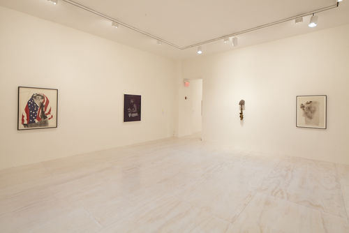 Four works by David Hammons, from left to right: "America the Beautiful," 1968, "Three Spades," 1971, "Bird," 1973, and "Untitled," 1969. Installation view at MoMA PS1, Long Island City, NY