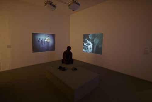 Two Ulysses Jenkins videos, "Two-Zone Transfer," 1979 and "Remnants of the Watts Festival," 1972–73. Installation view at MoMA PS1, Long Island City, NY