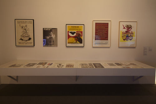 Ephemera on display, including posters by Andrew Zermeño and Sister Karen Boccalero. Installation view at MoMA PS1, Long Island City, NY