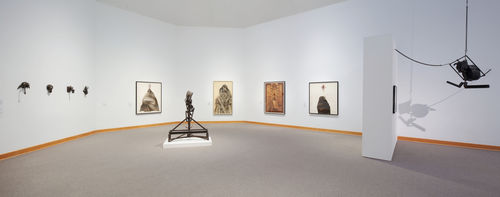 Foreground: Melvin Edwards, "The Lifted X," 1965; on wall, from left to right: works by Melvin Edwards and Charles White; hanging at right: Melvin Edwards, "Double Chain," 1966. Installation view at Williams College Museum of Art, Williamstown, MA