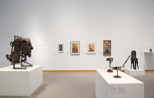Foreground: Melvin Edwards, "August the Squared Fire," 1965 and John T. Riddle Jr., "Panthers," 1970s and "Untitled," c. 1970; background: works by Betye Saar. Installation view at Williams College Museum of Art, Williamstown, MA