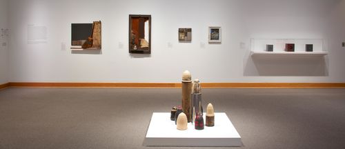 Foreground: Dale Brockman Davis, "Viet Nam War Games," 1969; background: works by Dale Brockman Davis, John Outterbridge, Noah Purifoy, and Daniel LaRue Johnson. Installation view at Williams College Museum of Art, Williamstown, MA