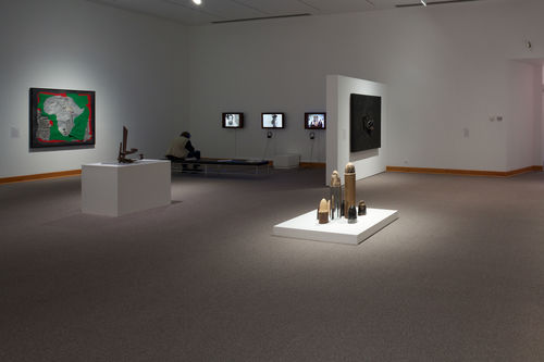Foreground, from left to right: Mark di Suvero, "Untitled," 1965 and Dale Brockman Davis, "Viet Nam War Games," 1969; background: works by Alonzo Davis and Daniel LaRue Johnson, three videos by Ulysses Jenkins. Installation view at Williams College Museum of Art, Williamstown, MA