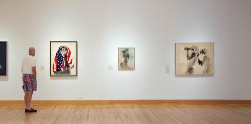 From left to right: David Hammons, "America the Beautiful," 1968, "Untitled," 1976, and "The Wine Leading the Wine," c. 1969. Installation view at Williams College Museum of Art, Williamstown, MA
