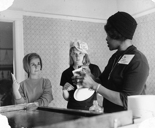 Volunteers during "Operation Teacup," an Easter week cleanup organized by the Student Committee for Improvement in Watts, at Watts Towers Arts Center, April 1965
