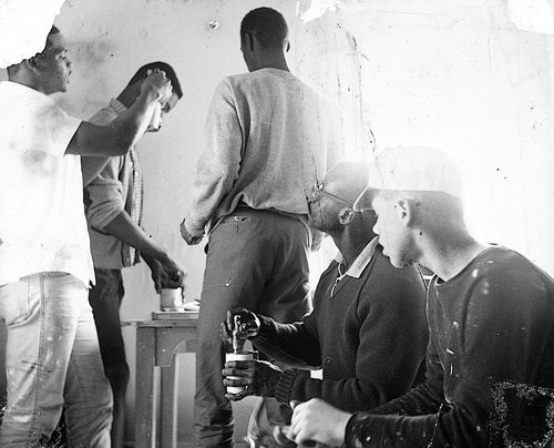 Group working during "Operation Teacup," an Easter week cleanup organized by the Student Committee for Improvement in Watts, at Watts Towers Arts Center